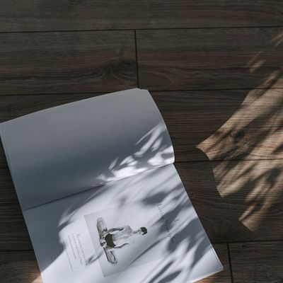 An empty, serene yoga studio with natural light, ready for practice.